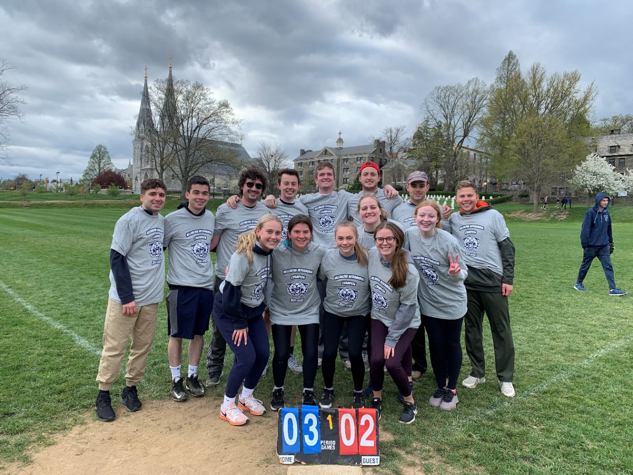 Students posing for softball champion photo