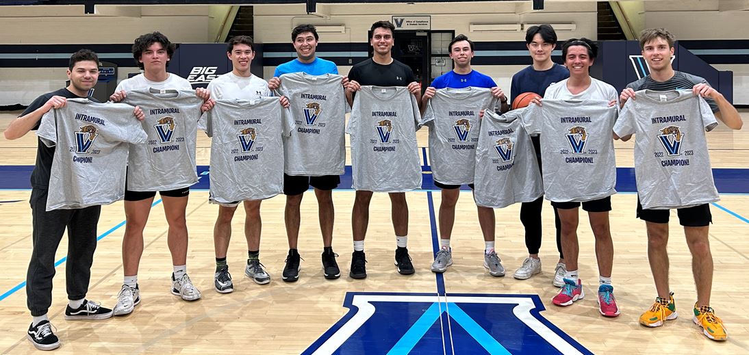 Male students posing for basketball champion photo
