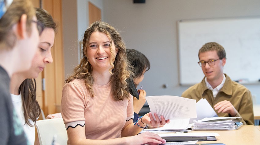 English Teaching Internships image of students and mentors at a table