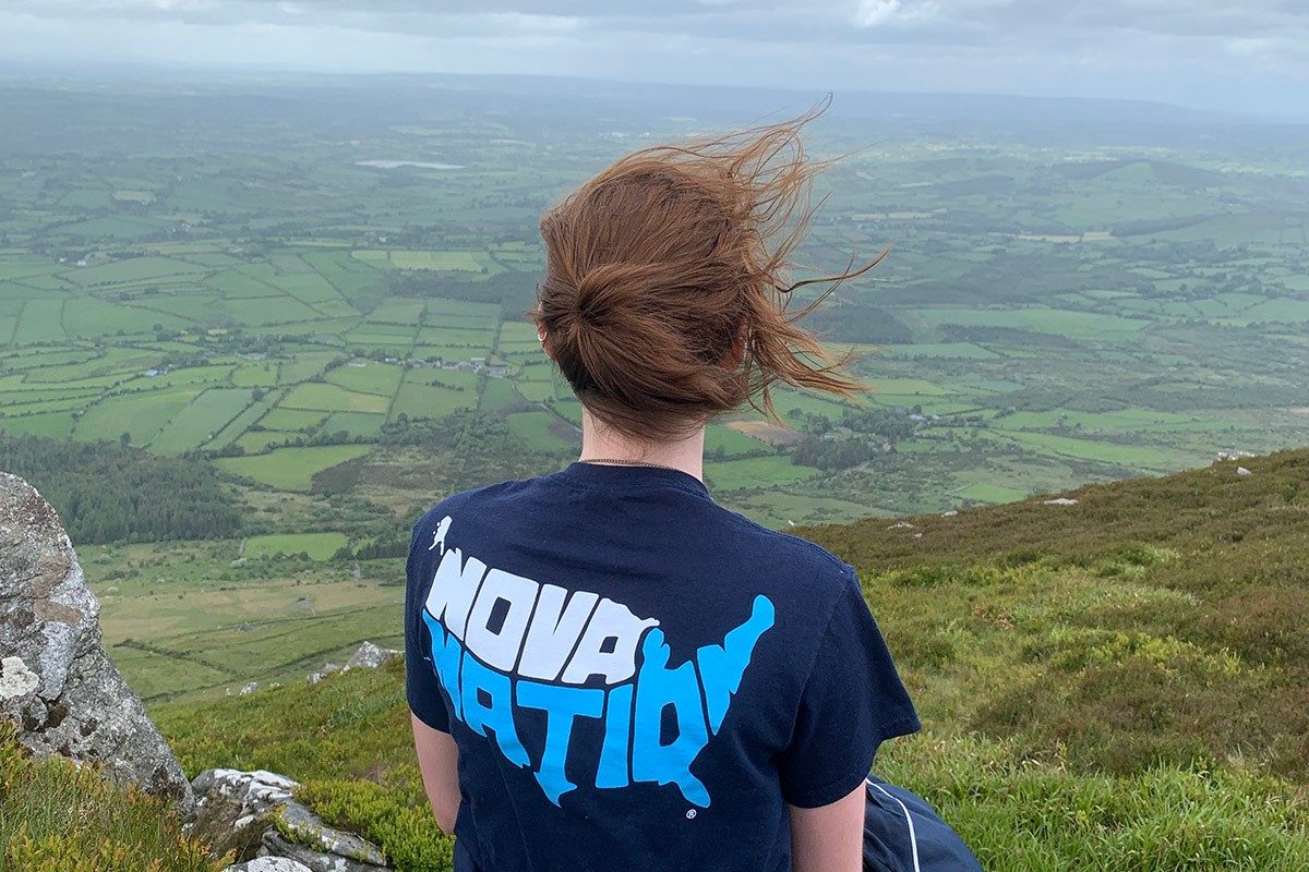 Student looks out at landscape in Ireland. Student looks out at landscape in Ireland.