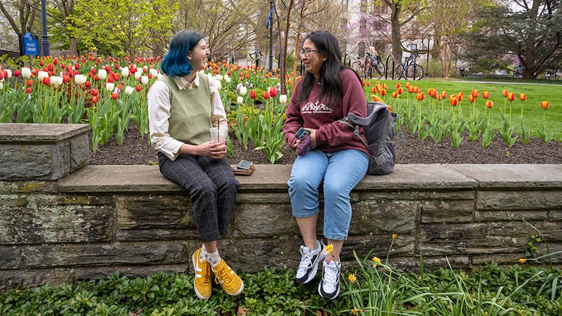 Students-discussing-outside-Falvey Students-discussing-outside-Falvey