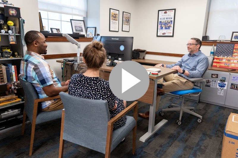 veteran-students-mike-brown Students and advisor speaking