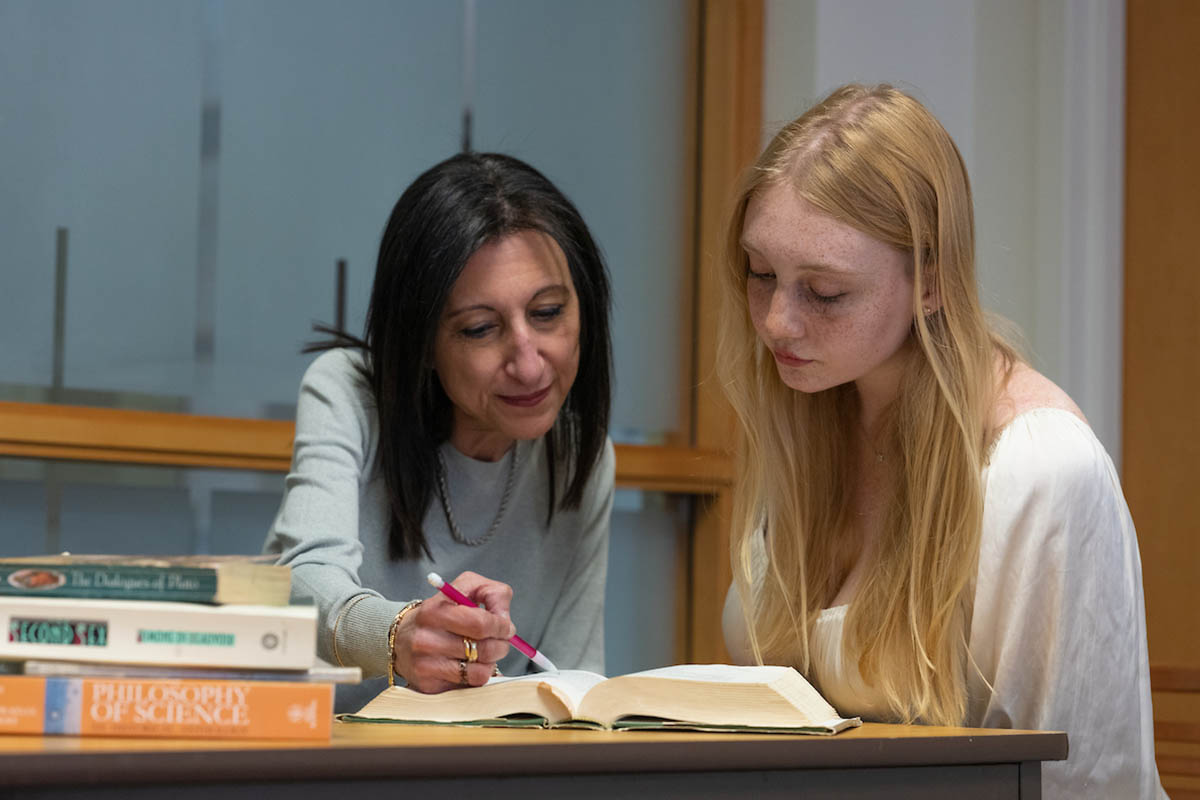 Professor helping a student