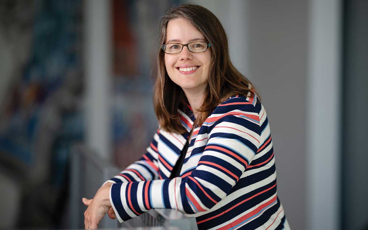 Portrait of Ana Santos Rutschman smiling.