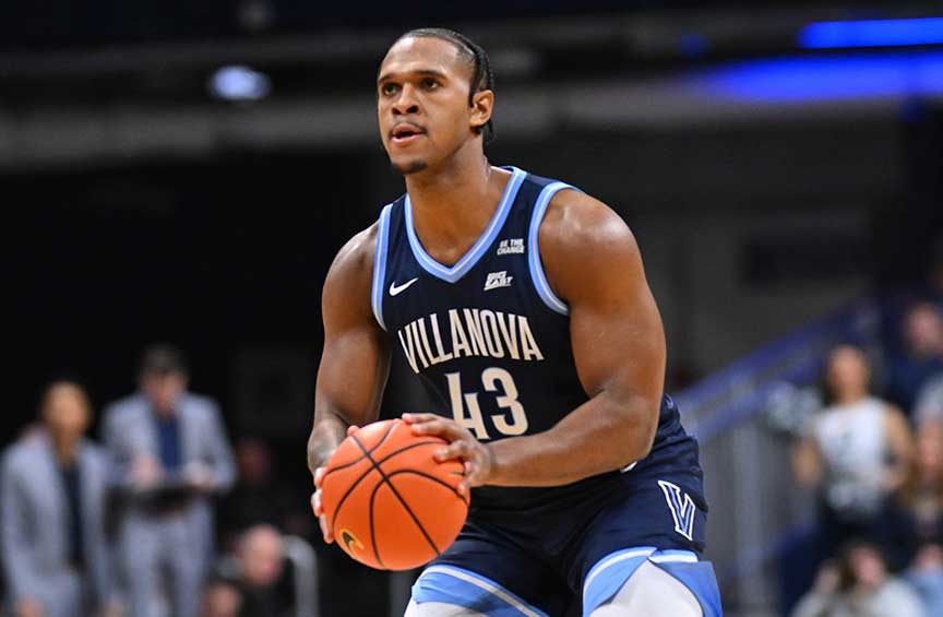 Villanova Men’s Basketball player Eric Dixon prepares to shoot the ball during a game.